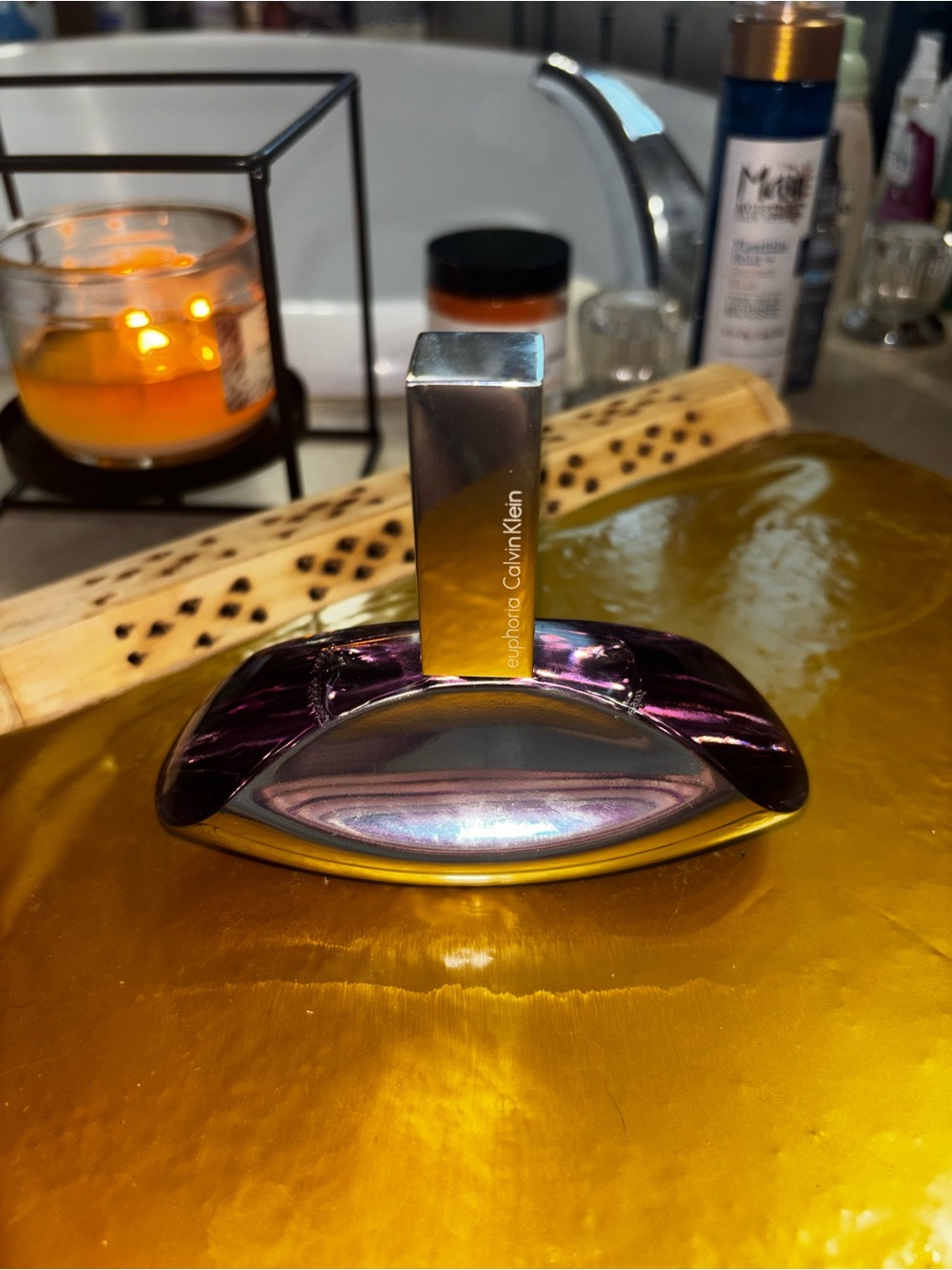 Calvin Klein metallic purple and silver decorative bottle